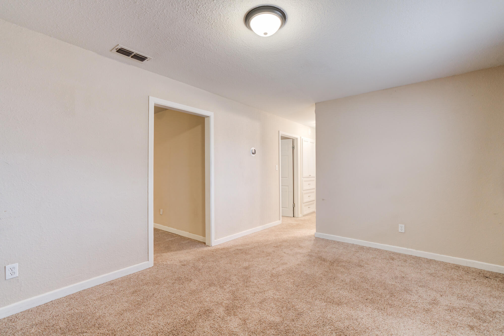 403 East 19th Street Littlefield, TX 79339 - Photo 9 of 34 a view of an empty room and closet area