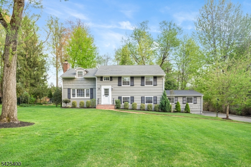 28 Spring Ridge Drive Berkeley Heights, NJ 07922 - Photo 1 of 46 a view of a house with a yard and sitting area