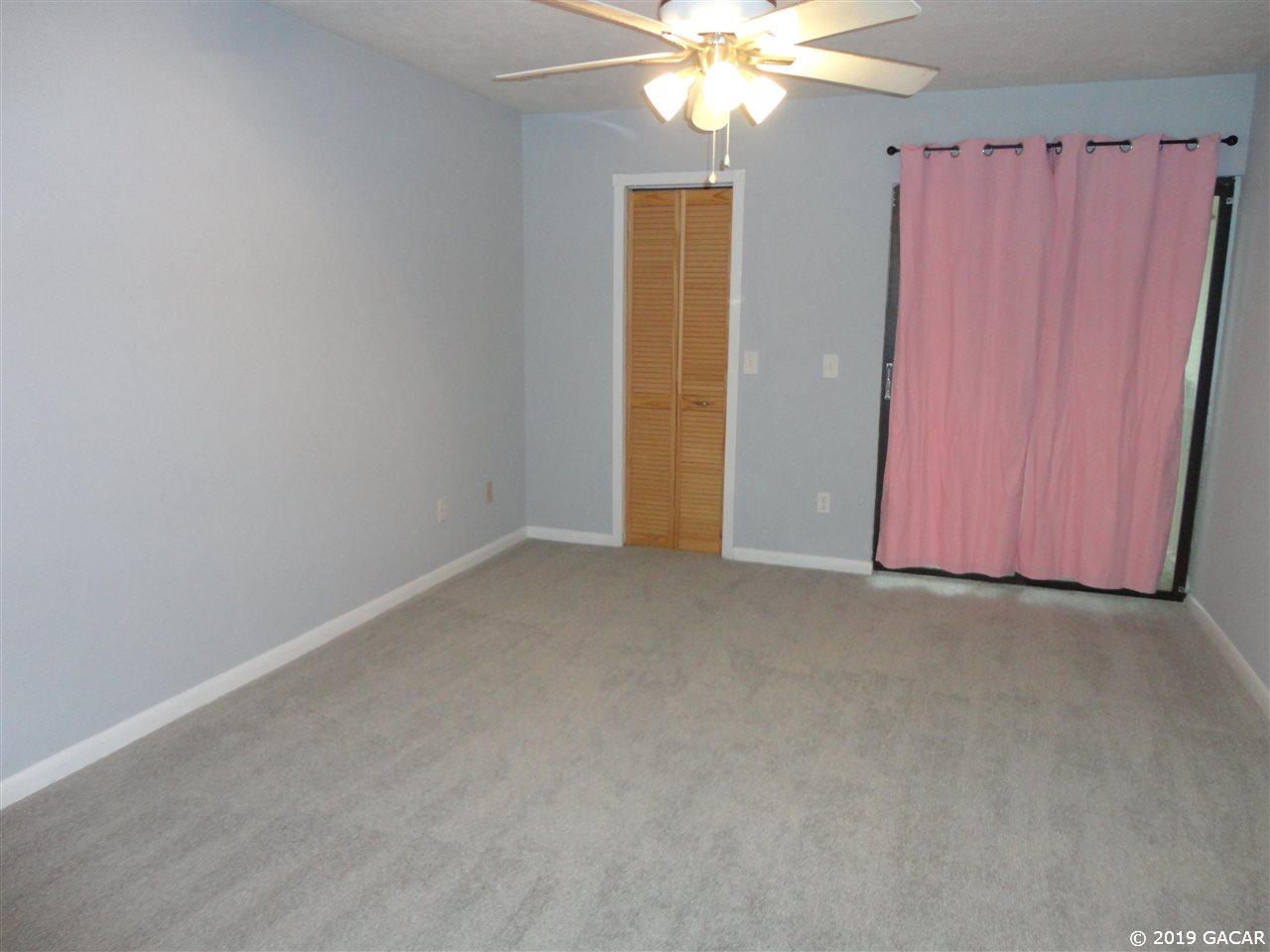 5518 Southwest 4th Place Gainesville, FL 32607 - Photo 7 of 9 Sliding door w/balcony