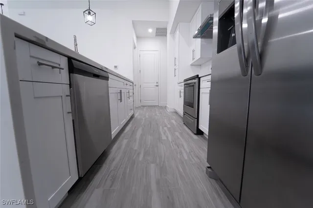 a view of hallway with stairs