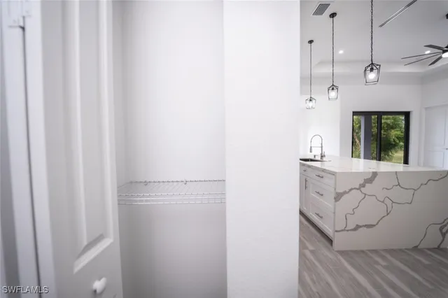 a kitchen with a refrigerator a sink and dishwasher