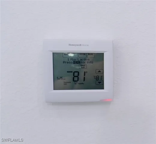 a view of a kitchen with sink and cabinets