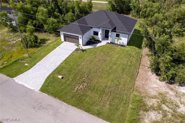 a view of a house with garden
