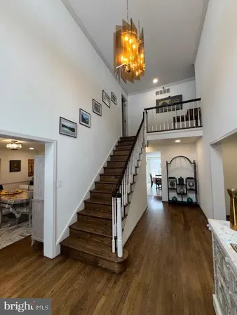 a view of an entryway and livingroom with furniture