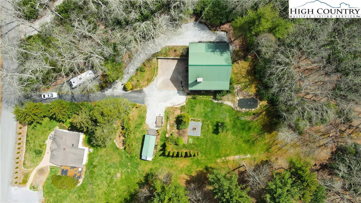 683 Joe Hartley Road Linville, NC 28657 - Photo 50 of 50 an aerial view of a house with a yard