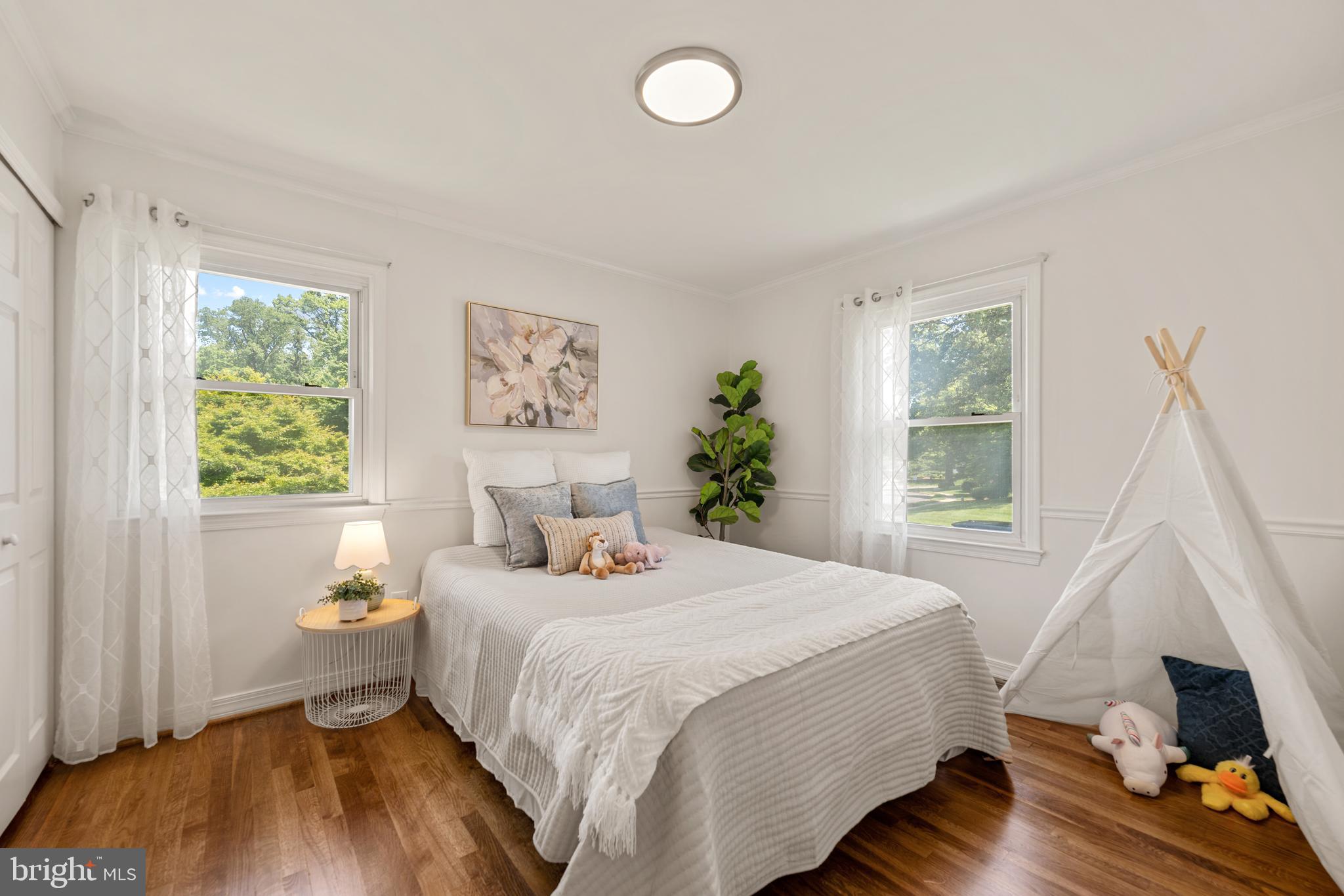 6800 Seton Court Springfield, VA 22152 - Photo 23 of 51 a bedroom with a bed and a window