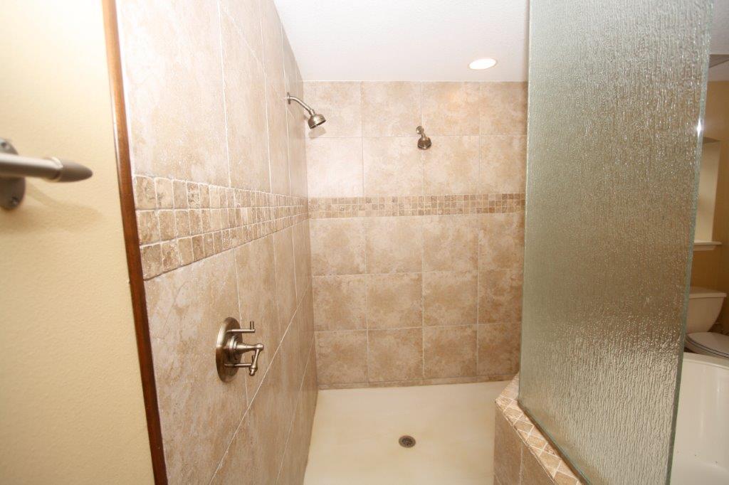 129 Walton Way Miramar Beach, FL 32550 - Photo 13 of 29 a bathroom with a shower and a tub