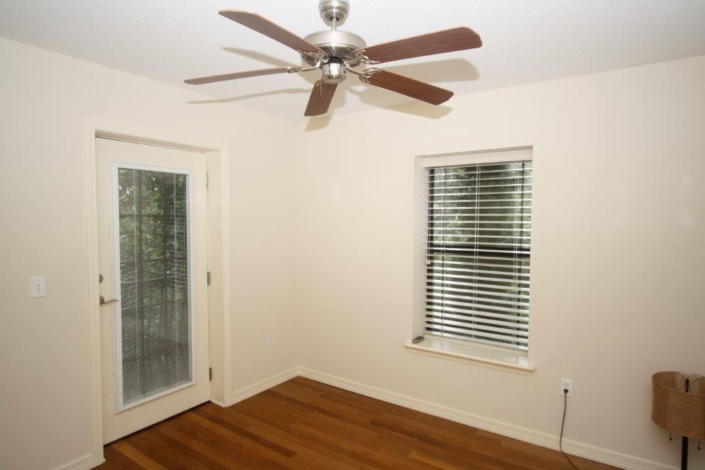 129 Walton Way Miramar Beach, FL 32550 - Photo 14 of 29 a view of empty room with wooden floor and fan