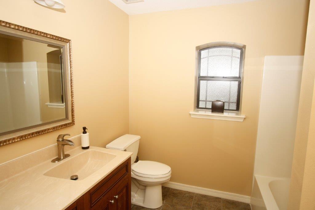 129 Walton Way Miramar Beach, FL 32550 - Photo 15 of 29 a bathroom with a sink mirror toilet and vanity