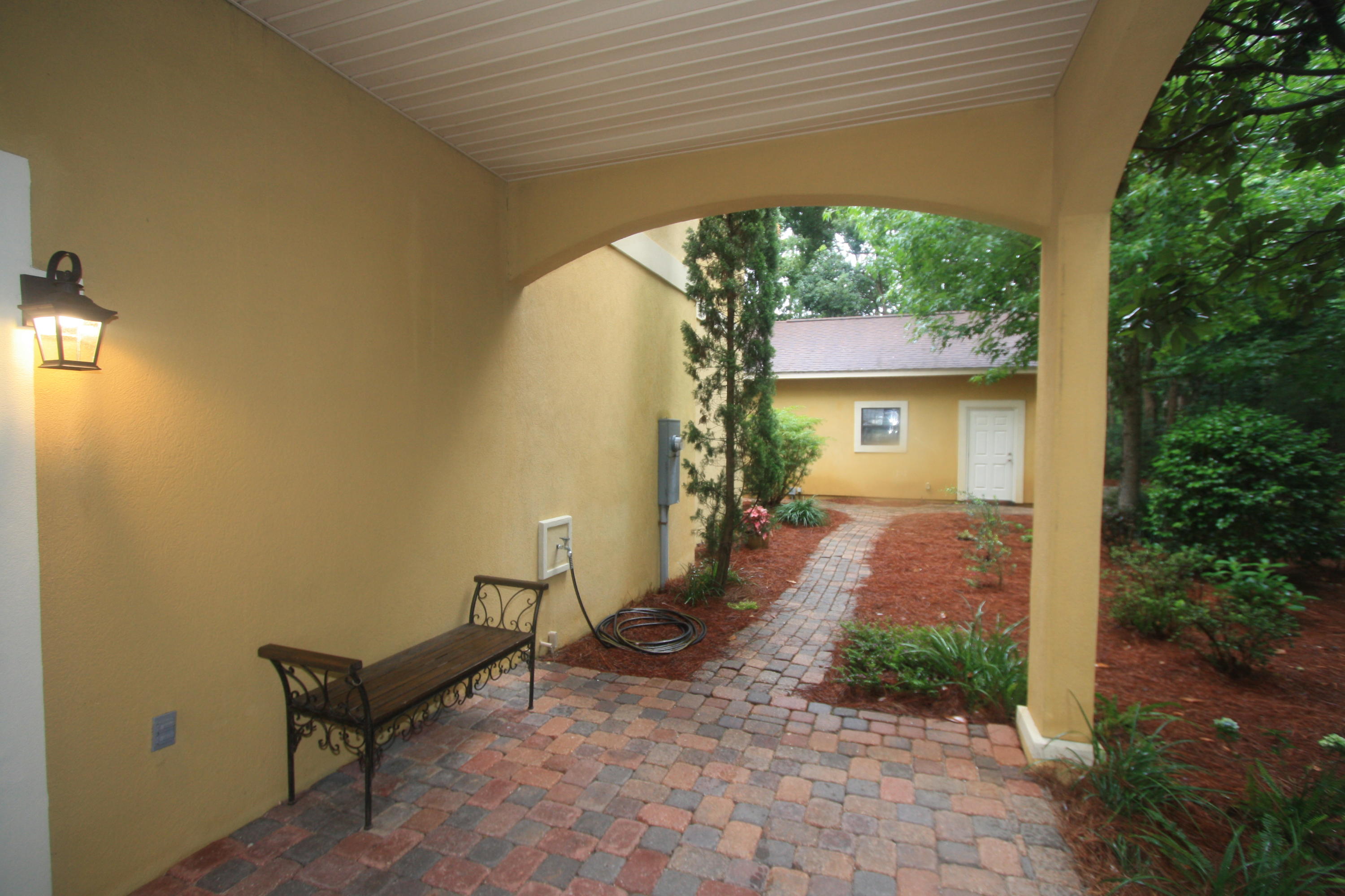 129 Walton Way Miramar Beach, FL 32550 - Photo 26 of 29 a view of a house with backyard and sitting area