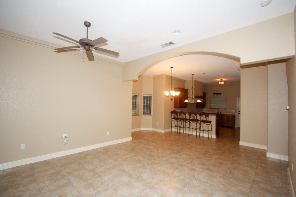 129 Walton Way Miramar Beach, FL 32550 - Photo 7 of 29 an empty room with a dining table and chairs