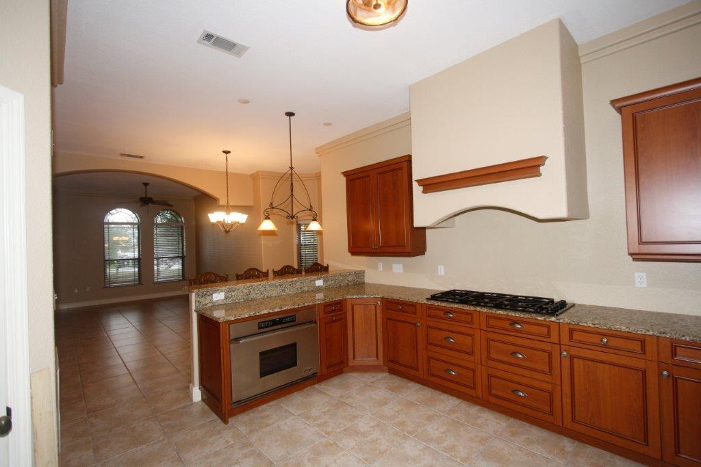 129 Walton Way Miramar Beach, FL 32550 - Photo 9 of 29 a spacious bathroom with a granite countertop double vanity sink and a mirror