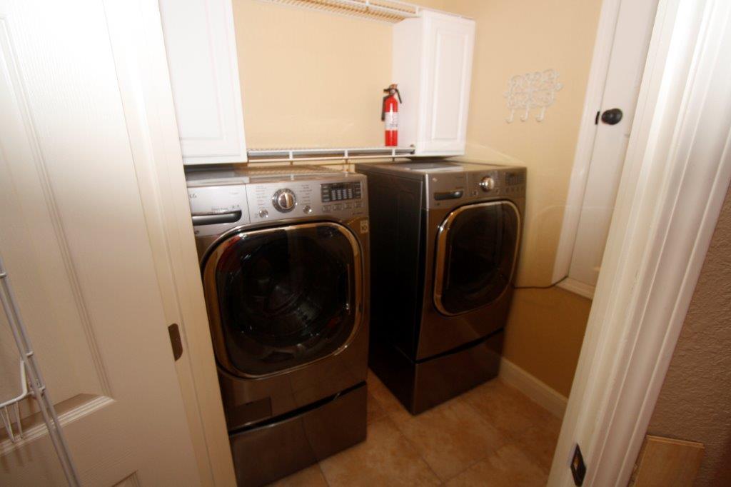 129 Walton Way Miramar Beach, FL 32550 - Photo 10 of 29 a utility room with dryer and washer
