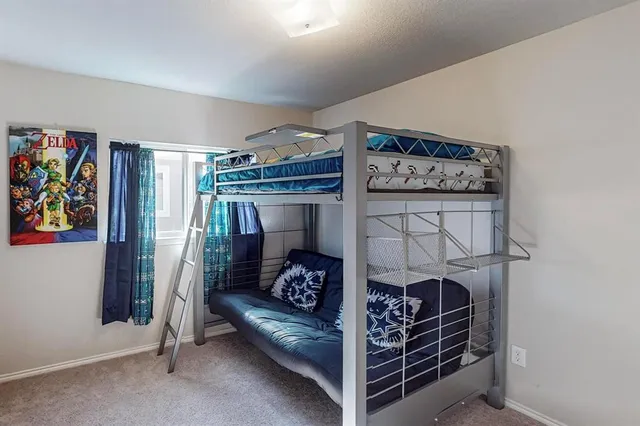 a bedroom with bunk bed