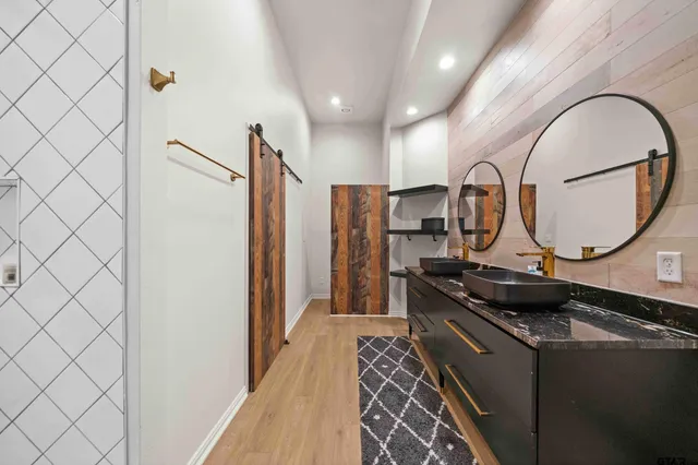 a kitchen with a sink and a stove