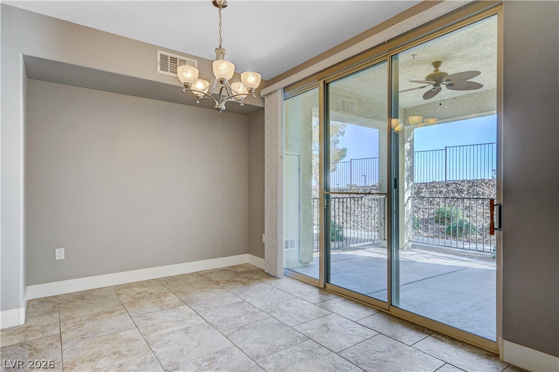 2555 Hampton Road, Unit 6108 Henderson, NV 89052 - Photo 13 of 63 Unfurnished room with ceiling fan and a chandelier