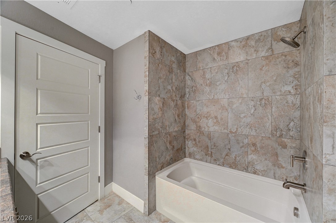 2555 Hampton Road, Unit 6108 Henderson, NV 89052 - Photo 15 of 63 Bathroom with shower / washtub combination and baseboards