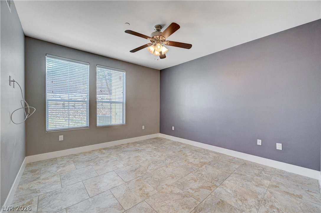 2555 Hampton Road, Unit 6108 Henderson, NV 89052 - Photo 19 of 63 Spare room featuring a ceiling fan and baseboards