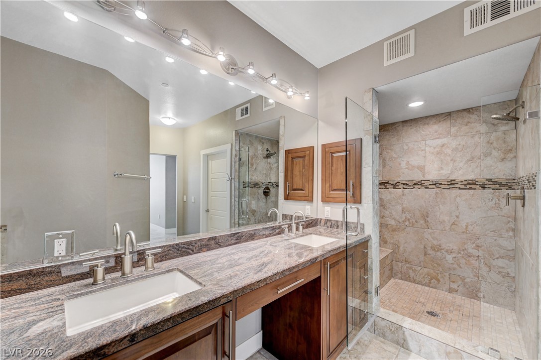 2555 Hampton Road, Unit 6108 Henderson, NV 89052 - Photo 22 of 63 Full bath featuring double vanity, a shower stall, and recessed lighting