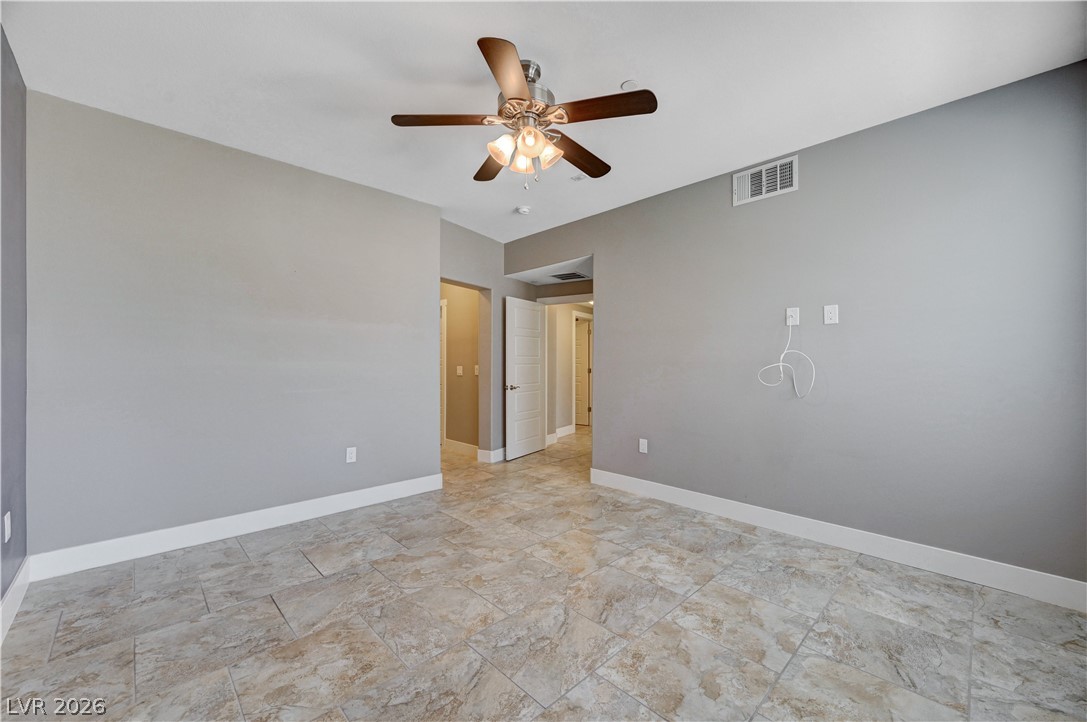 2555 Hampton Road, Unit 6108 Henderson, NV 89052 - Photo 24 of 63 Spare room with baseboards and a ceiling fan