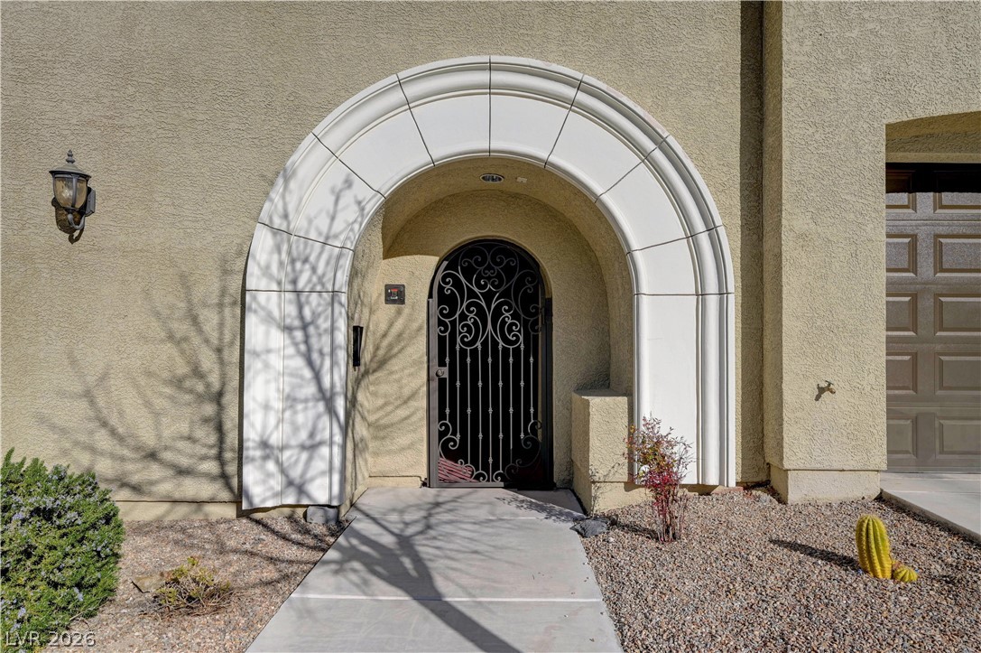 2555 Hampton Road, Unit 6108 Henderson, NV 89052 - Photo 34 of 63 View of exterior entry featuring stucco siding