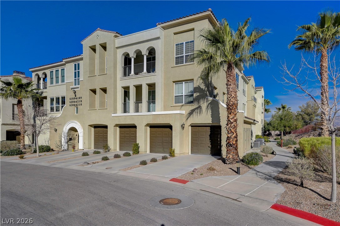 2555 Hampton Road, Unit 6108 Henderson, NV 89052 - Photo 35 of 63 View of property featuring driveway and an attached garage