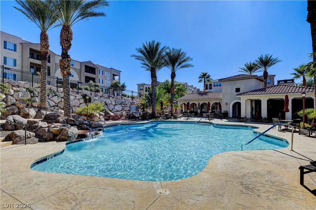 2555 Hampton Road, Unit 6108 Henderson, NV 89052 - Photo 43 of 63 Community pool with a patio area