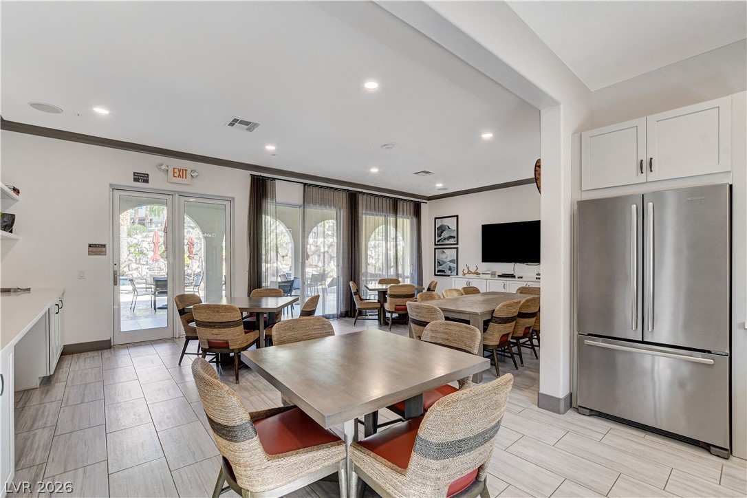 2555 Hampton Road, Unit 6108 Henderson, NV 89052 - Photo 54 of 63 Dining room with ornamental molding and recessed lighting
