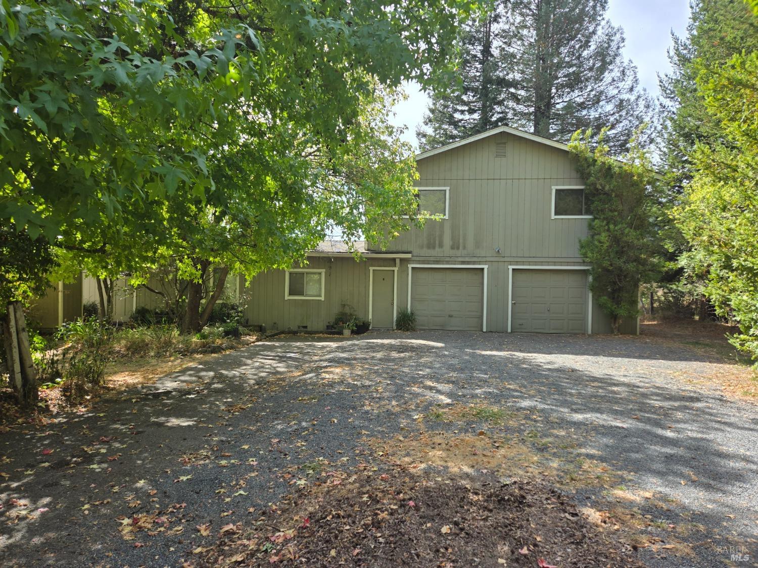 388 Ferguson Road Sebastopol, CA 95472 - Photo 1 of 1 a house with trees in front of it
