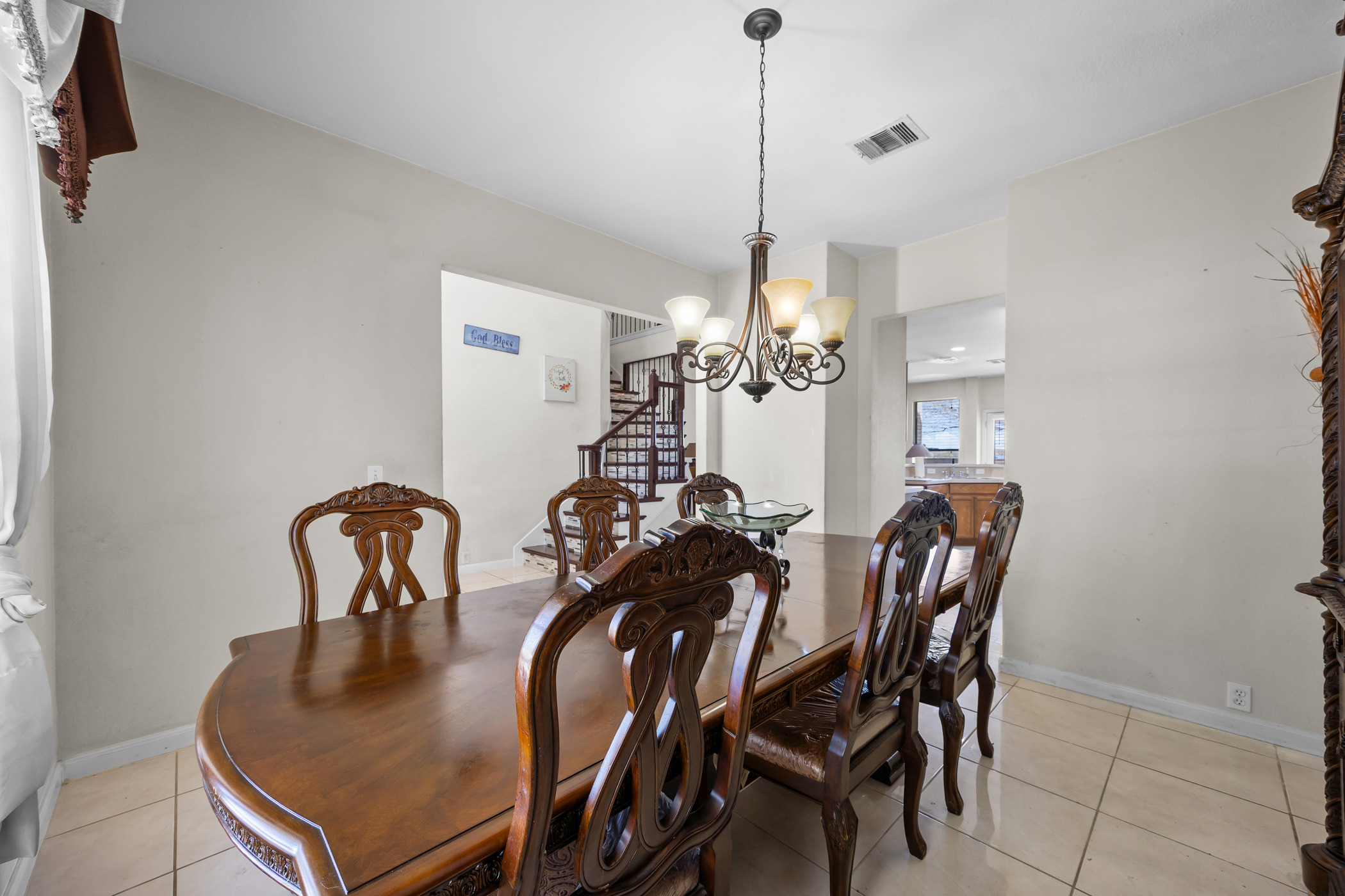 3502 Shiraz Loop Round Rock, TX 78665 - Photo 3 of 23 Dining room with a chandelier and light tile patterned flooring