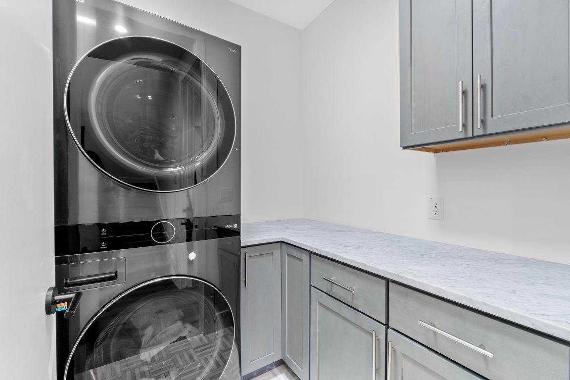 1023 East 45th Street, Unit 1 Austin, TX 78751 - Photo 18 of 30 a utility room with sink dryer and washer