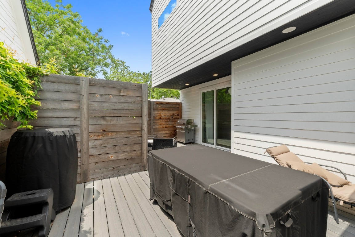 1023 East 45th Street, Unit 1 Austin, TX 78751 - Photo 27 of 30 a terrace of a house with wooden floor and seating space