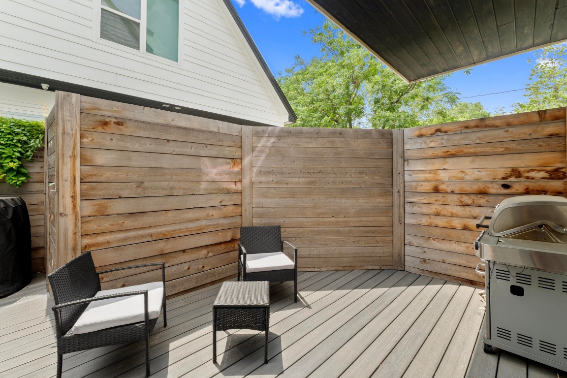 1023 East 45th Street, Unit 1 Austin, TX 78751 - Photo 29 of 30 a view of a patio with wooden chairs