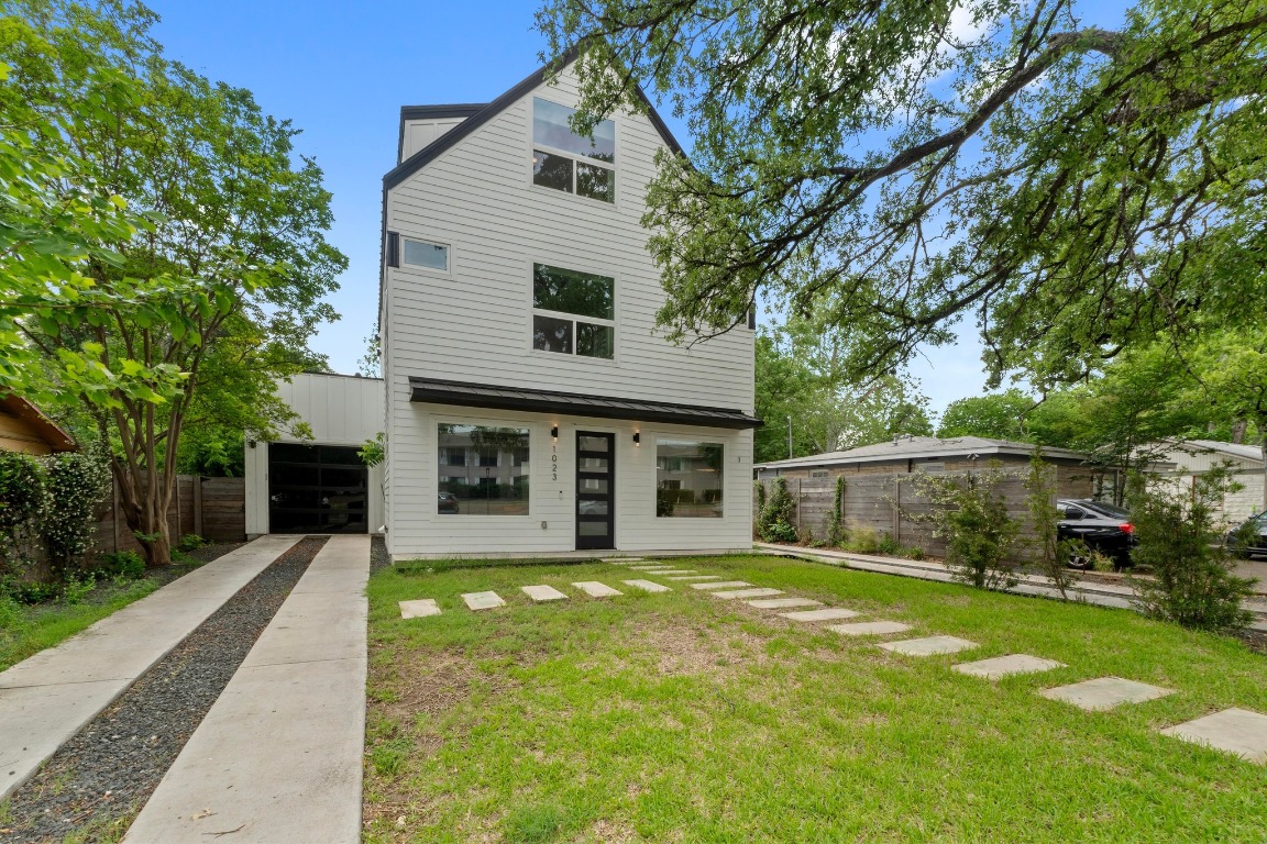 1023 East 45th Street, Unit 1 Austin, TX 78751 - Photo 3 of 30 a front view of house with yard and green space