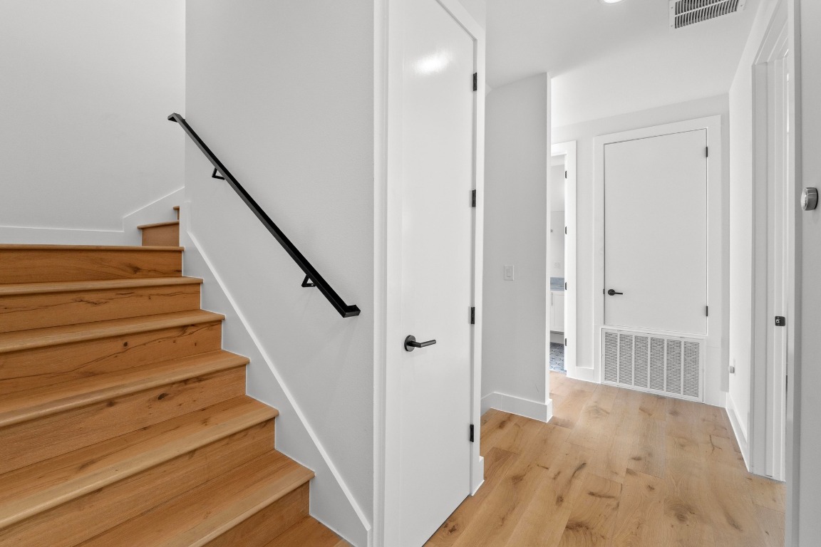1023 East 45th Street, Unit 1 Austin, TX 78751 - Photo 10 of 30 a view of a hallway with wooden floor and entryway