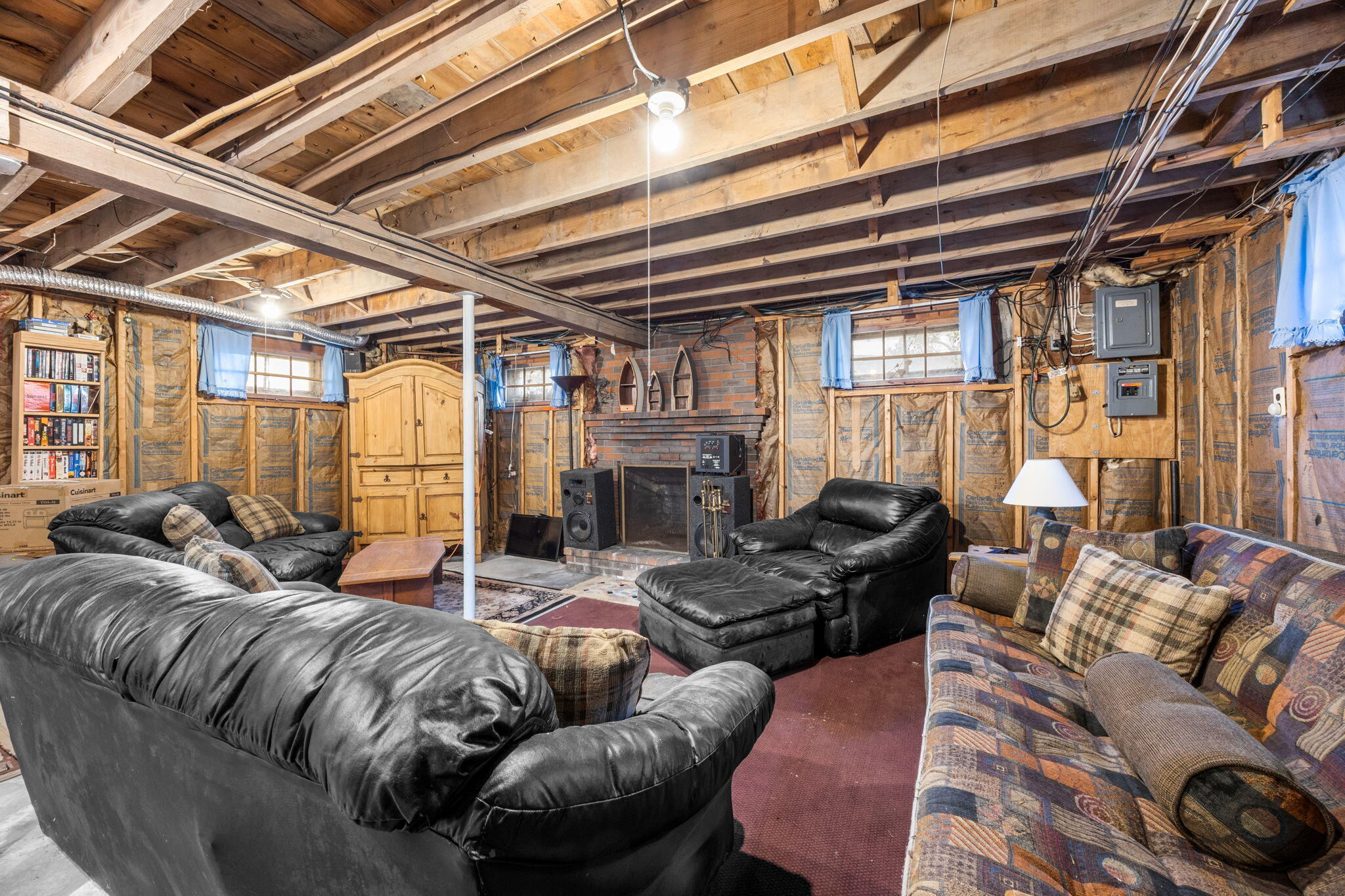 91 Wickertree Road North Falmouth, MA 02556 - Photo 22 of 40 a living room with furniture and a fireplace