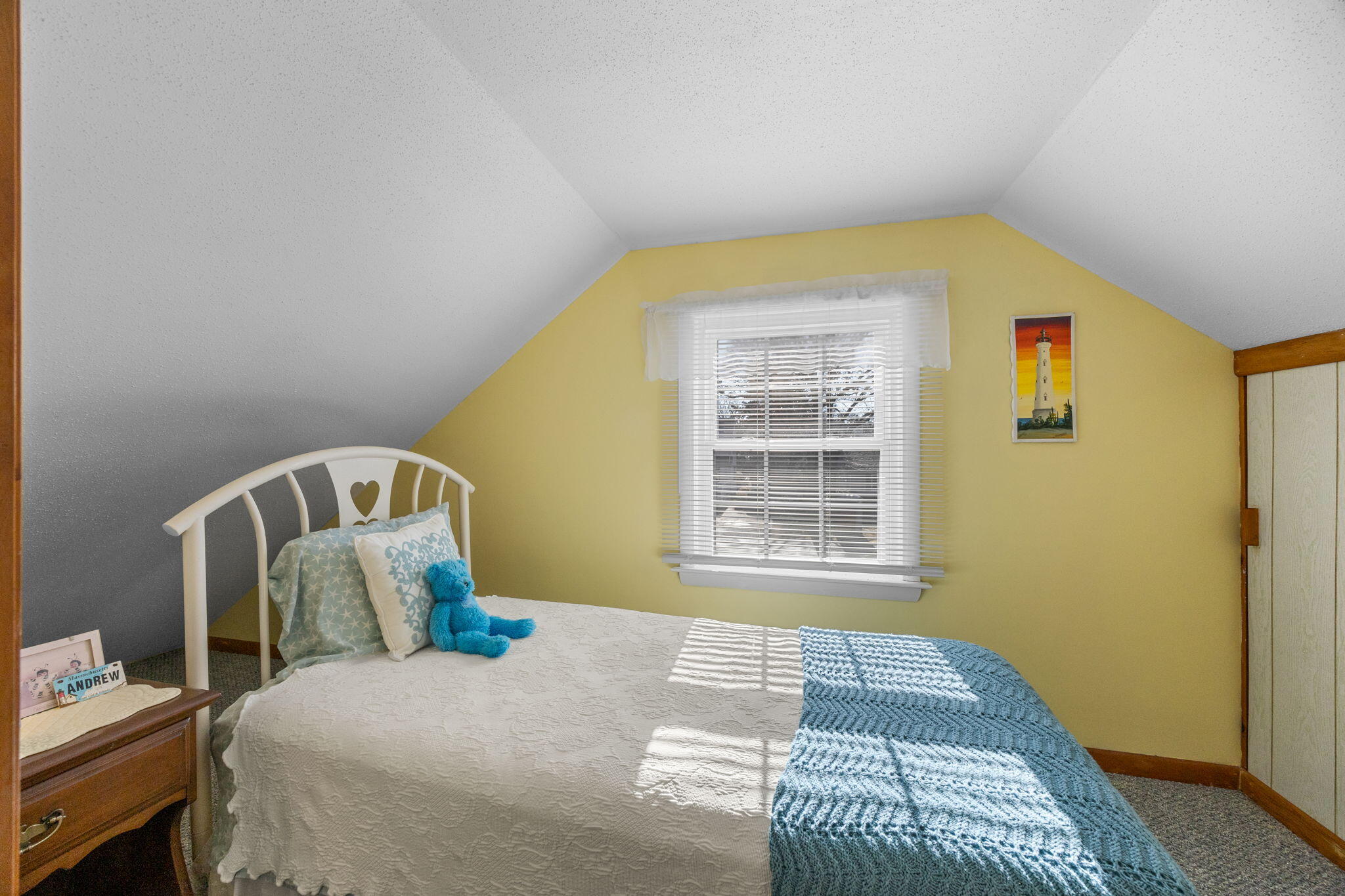 91 Wickertree Road North Falmouth, MA 02556 - Photo 29 of 40 a bedroom with a bed and wooden floor