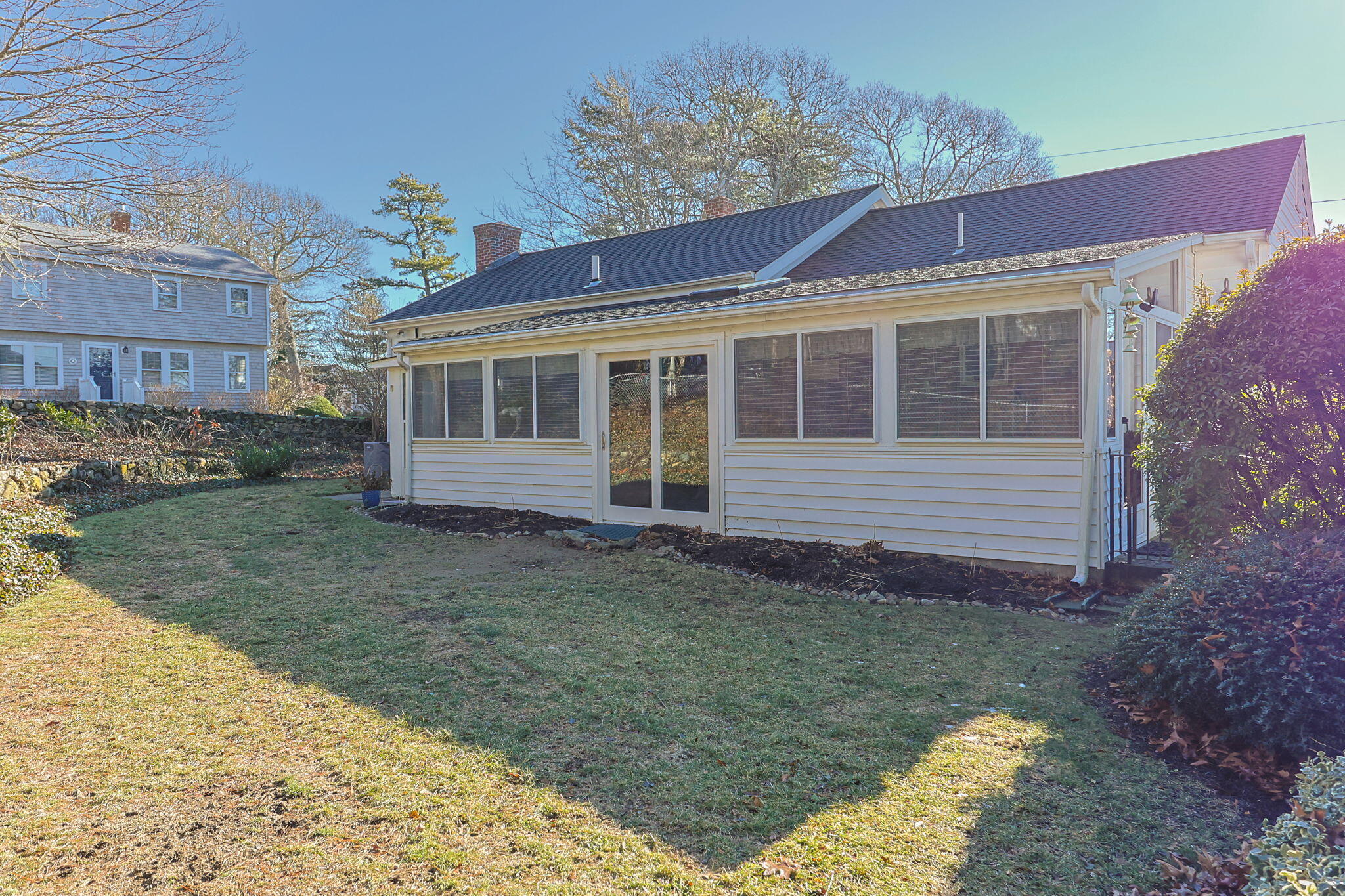 91 Wickertree Road North Falmouth, MA 02556 - Photo 31 of 40 a view of a house with a yard