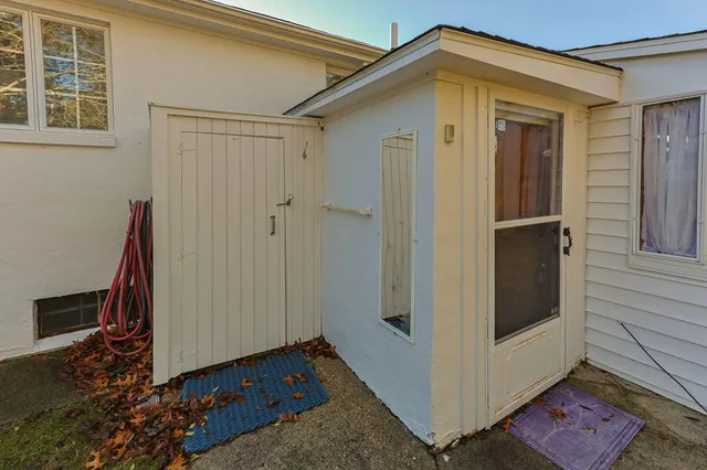 an aerial view of houses with outdoor space
