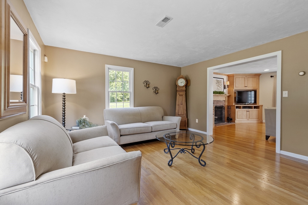 51 Still River Road Bolton, MA 01740 - Photo 16 of 41 a living room with furniture and a couch