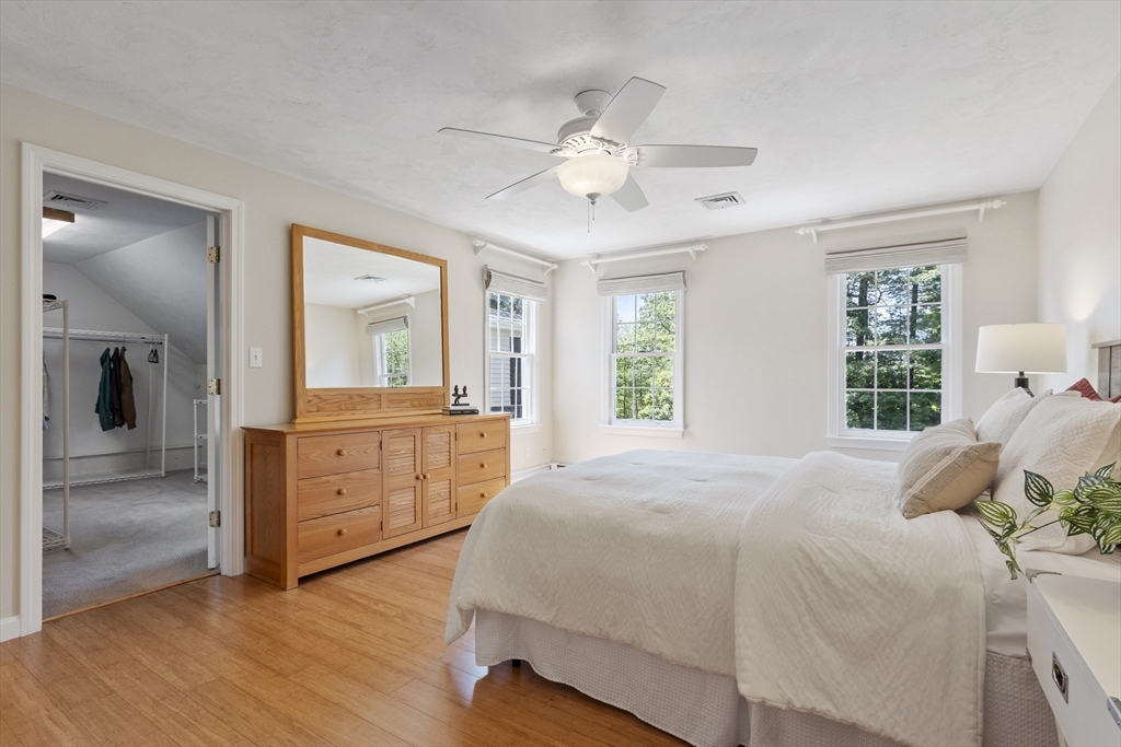 51 Still River Road Bolton, MA 01740 - Photo 20 of 41 a bedroom with a bed and a dresser