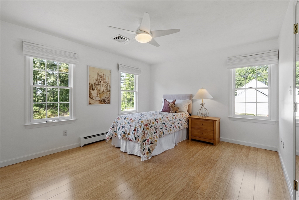 51 Still River Road Bolton, MA 01740 - Photo 23 of 41 a bed room with a bed and a window
