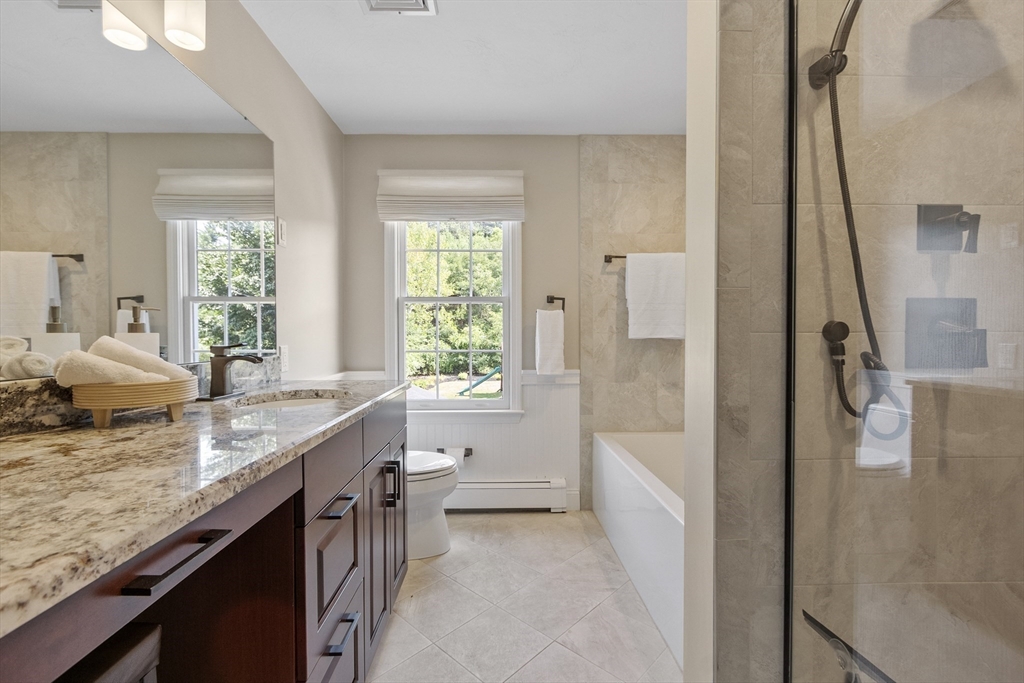 51 Still River Road Bolton, MA 01740 - Photo 26 of 41 a bathroom with a granite countertop sink and a mirror