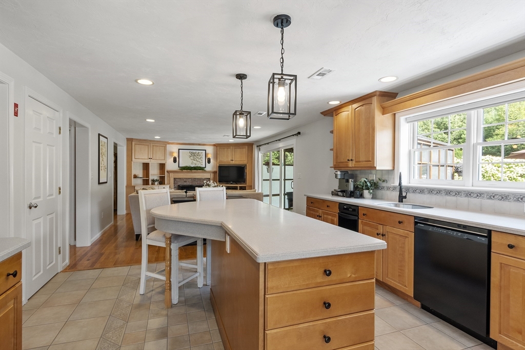 51 Still River Road Bolton, MA 01740 - Photo 6 of 41 a kitchen with a sink a counter top space stainless steel appliances and a large window