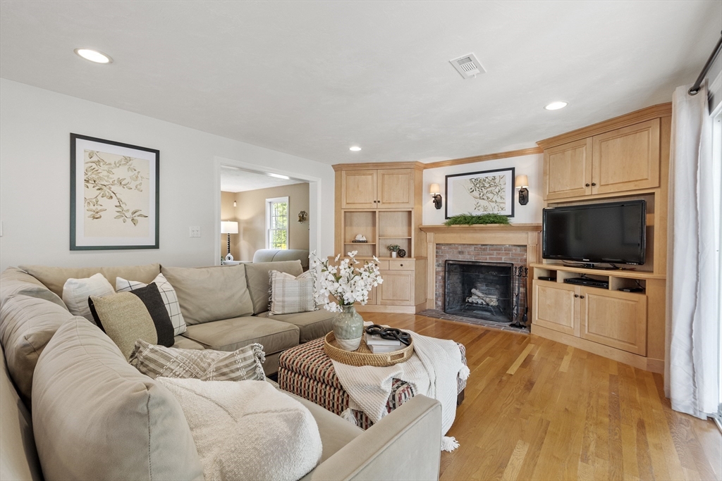 51 Still River Road Bolton, MA 01740 - Photo 7 of 41 a living room with furniture fireplace and flat screen tv