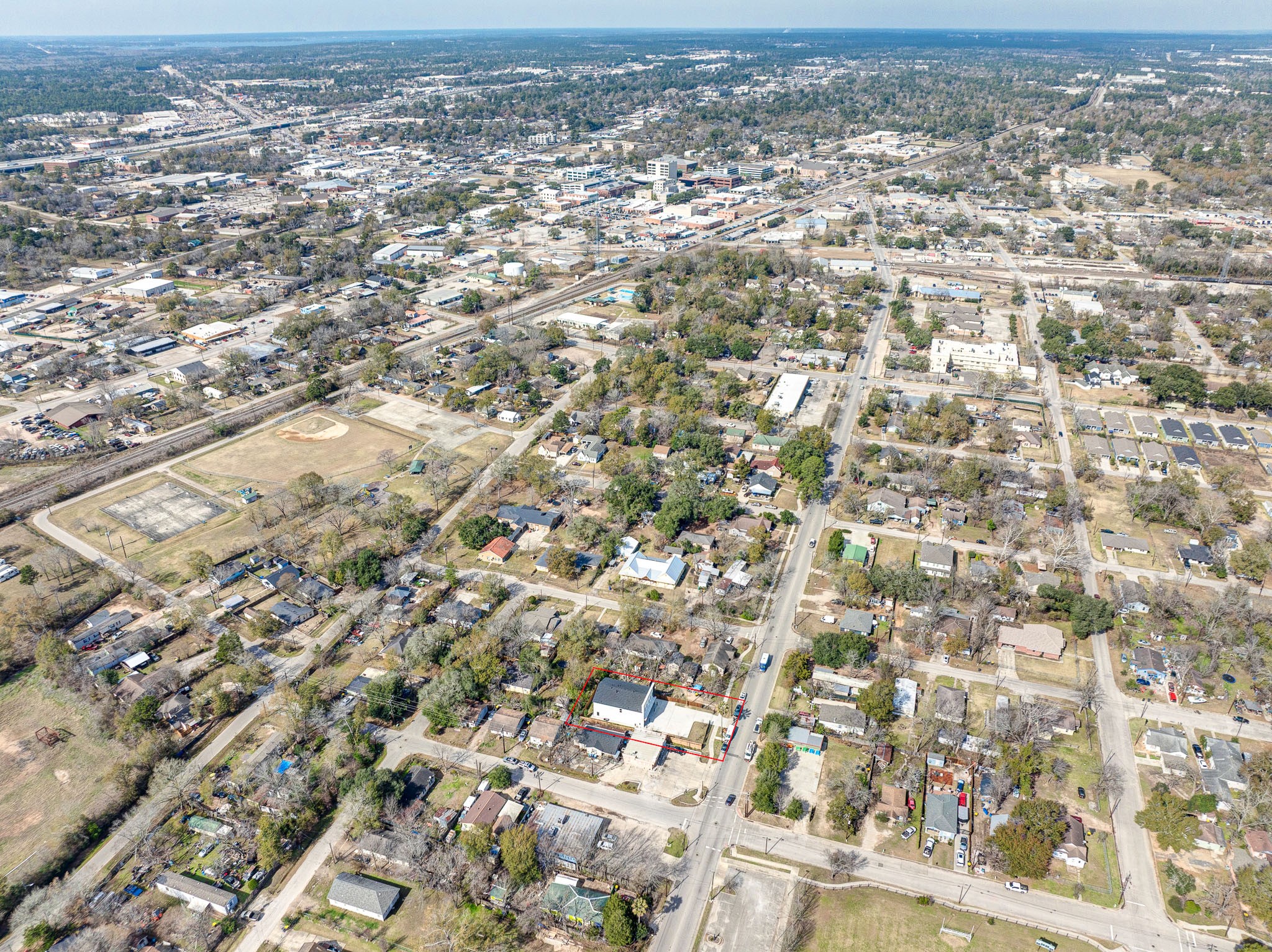 704 South 1st Street Conroe, TX 77301 - Photo 26 of 26 Nestled in the vibrant heart of Conroe, this property offers unbeatable convenience and a dynamic community atmosphere.
