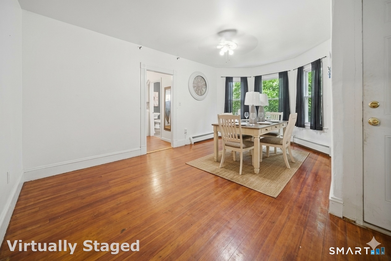 12 Webster Street Vernon, CT 06066 - Photo 6 of 33 a living room with furniture and a table