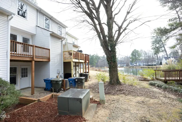 a backyard of a house with outdoor seating