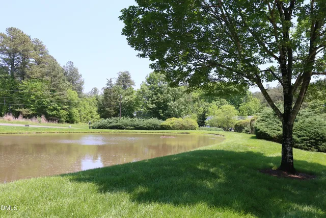 a view of a lake with a big yard