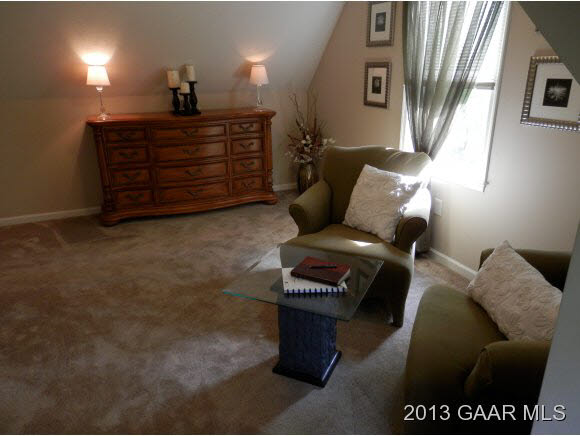 2198 Lyndhurst Road Waynesboro, VA 22980 - Photo 17 of 27 a living room with furniture a ceiling fan and a rug
